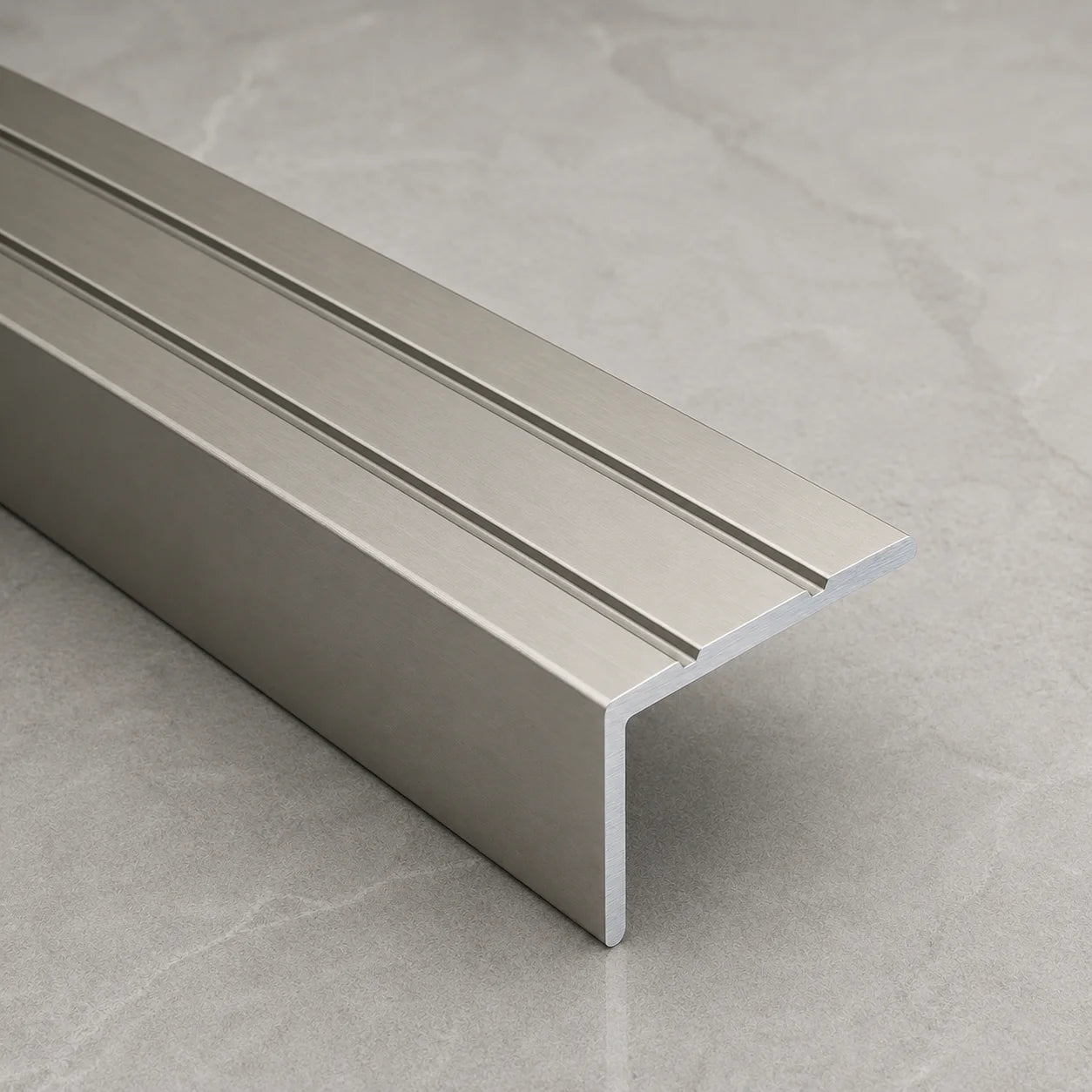 Self‑Adhesive Stair Nosing Inox